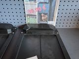 a magazine on the shelf of a store with a price tag