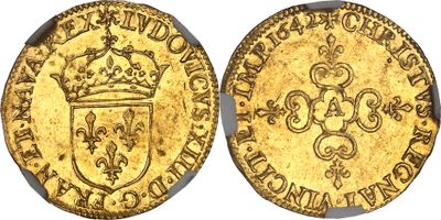 une pièce d'or surmontée d'une couronne