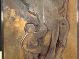 statue of a woman holding a child in her arms
