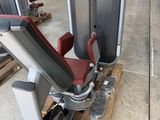 a gym machine that is sitting on a pallet in a warehouse