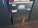 an image of a refrigerator with a freezer on top of it