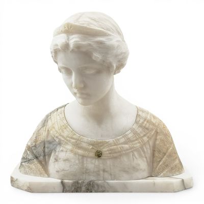 a marble bust of a woman holding a book