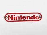 a nintendo logo on the back of a nintendo wii game console