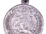 an image of a silver coin with a coat of arms on it