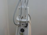 a machine that is sitting in the corner of a room