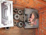 a metal box with a bunch of tools inside of it