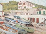 many boats that are sitting in the sand