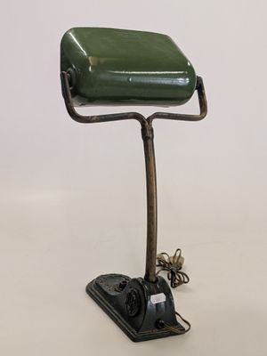 an image of a desk lamp with a green shade on it