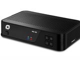 a black box with a remote control sitting on top of it
