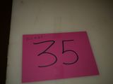 a pink sign with the number 35 on it