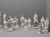 many figurines that are sitting on a table