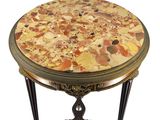 a small table with a marble top on a stand