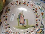 many plates that are sitting on a table