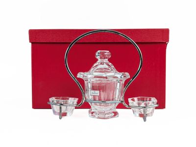 an image of a red box with a glass teapot and cups