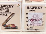 two boxes of hawkey fire patrol cigarettes sitting on a table