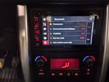 an image of a car dashboard with a digital display