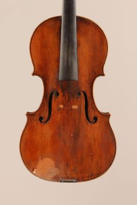an old violin with a bow on a white background