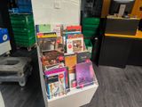 a display of books in a store with a lot of them