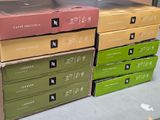 several boxes are stacked on top of each other on a table