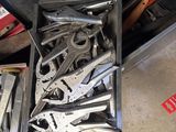 a box full of tools that are sitting on the floor