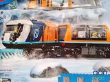 a box of legos with a train on it