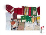a lot of books that are sitting on a table