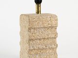 an image of a stone block with a light on top of it