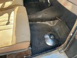 an image of the inside of a car with the door open