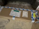 a box that is sitting on the floor next to a door