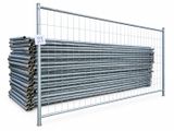 a large group of gal steel fence posts stacked on top of each other