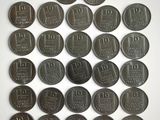 a lot of coins that are sitting on a table