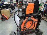 a machine that is sitting on a cart in a room