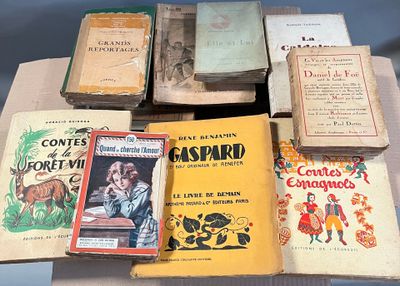 many books that are sitting on top of a table