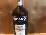 a bottle of wine that is sitting on a table