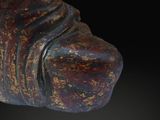 an image of a sculpture of a shoe on a black background