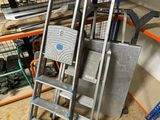 a ladder that is sitting in a room next to some shelves