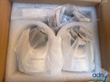 a box with two pairs of shoes in it