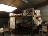 a room with a lot of boxes and boxes on the shelves
