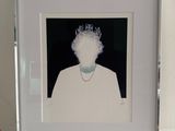 a picture of a picture of a woman with a necklace on
