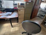 a chair that is sitting in front of a desk
