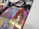 a lanyard that has a picture of a woman on it