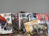 a lot of comic books sitting on a table