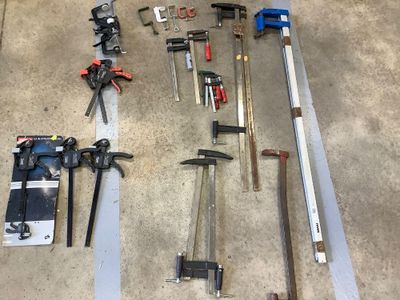 a lot of tools that are laying out on the floor