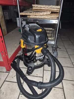 a picture of a wet dryer sitting on a tiled floor