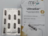 a close up of a package of pills sitting on a table