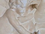a relief of a woman and a child on a wall