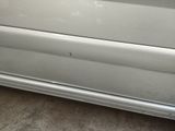 a white car that is parked in a garage