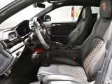 a picture of the inside of a car with the driver ' s seat up