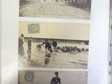 a picture of a man rowing a boat in the water