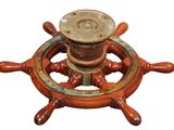 a ship wheel with a spool on top of it